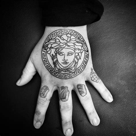 versace wrist tattoo|medusa full body tattoo.